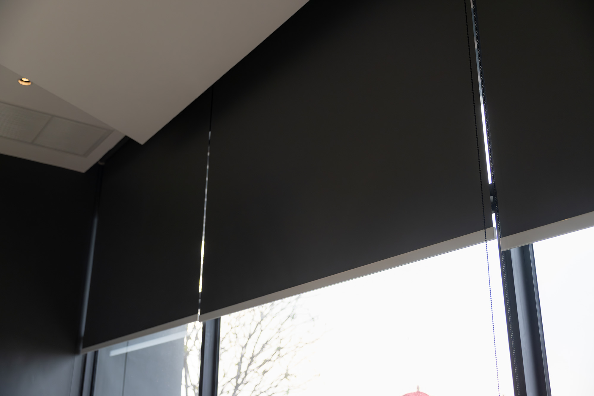 Black Roller Blinds on Large Windows by Australian Plantation Shutters